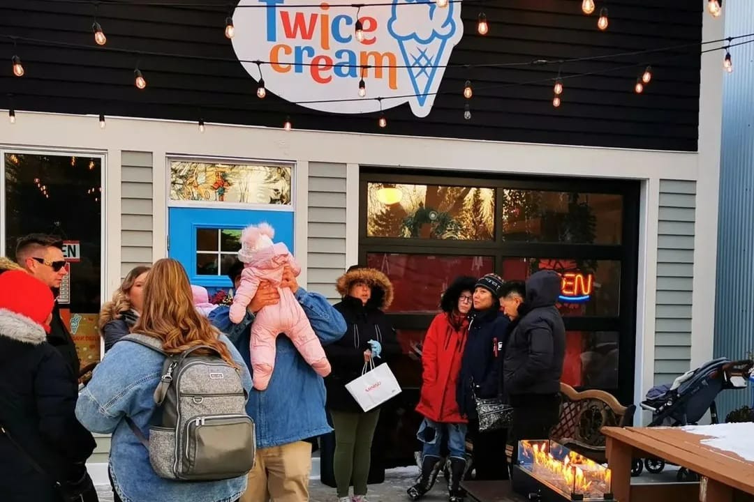 People stand outside Twice Cream on a winter's day