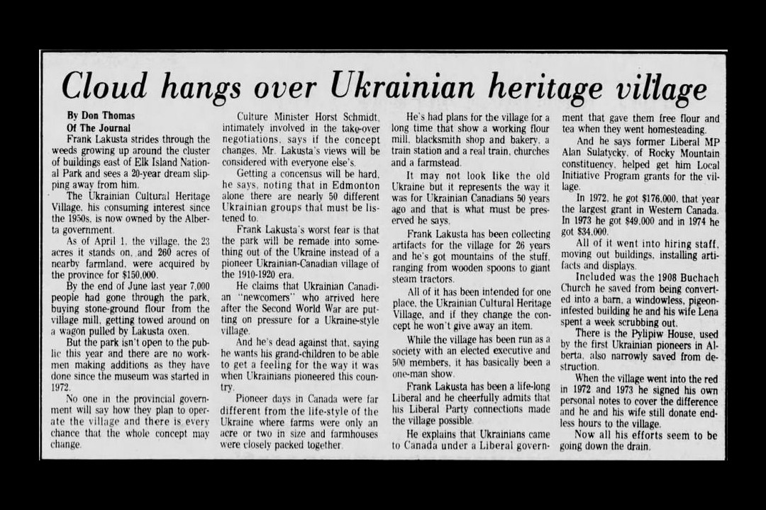A newspaper clipping with the headline "Cloud hangs over Ukrainian heritage village"