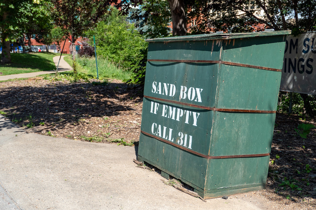 A large green box reads "SAND BOX IF EMPTY CALL 311."