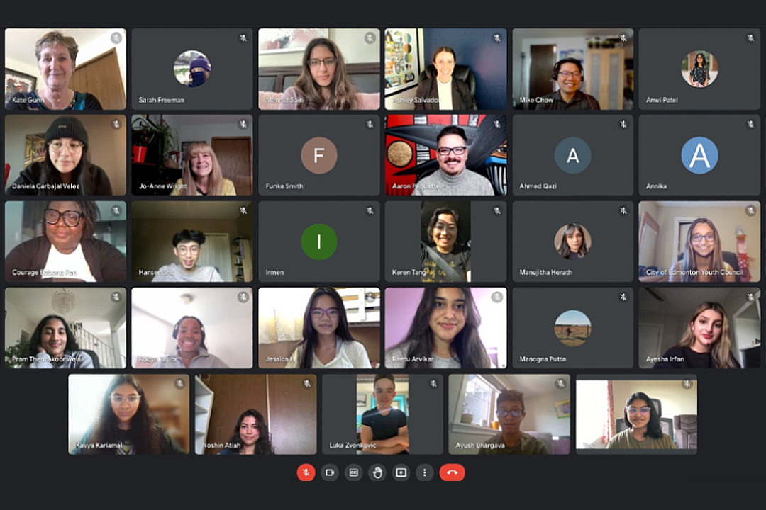 Screenshot of an online meeting room that mostly includes young people, plus several city councillors