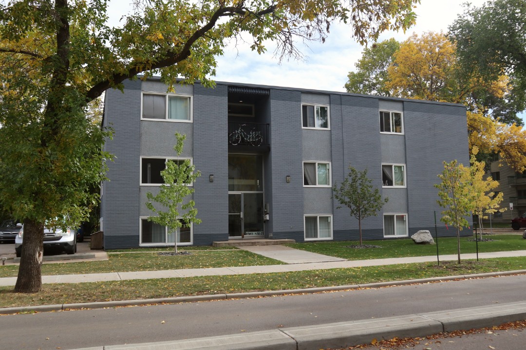 A three-storey walk-up apartment building in Strathcona.