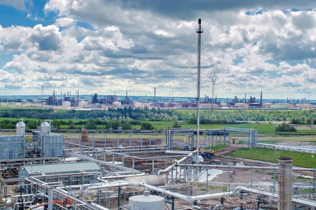 A petrochemical plant, with more industrial development in the background