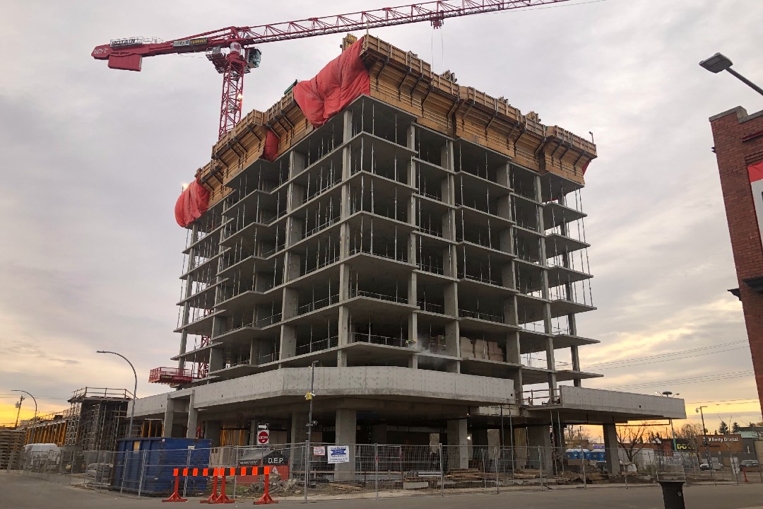 The concrete bones of a six-storey apartment building that is being constructed in Old Strathcona.