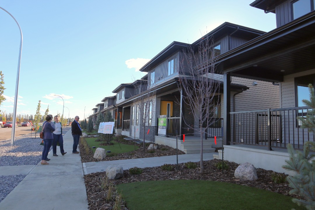 A row of grey and black duplexes.