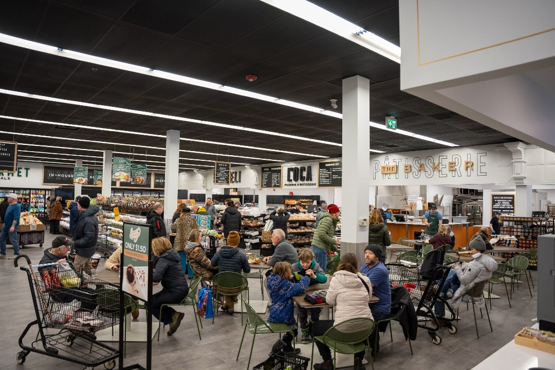 Customers inside L'OCA Quality Market.