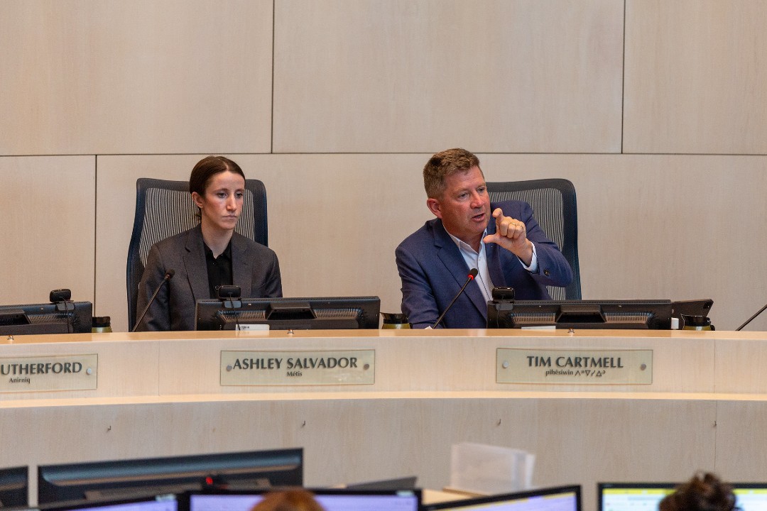 Councillors Ashley Salvador and Tim Cartmell in Edmonton City Council chambers.