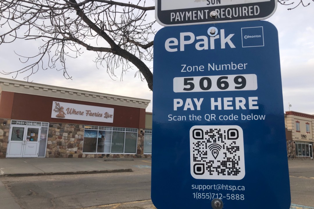 A photo of a parking sign in Edmonton.