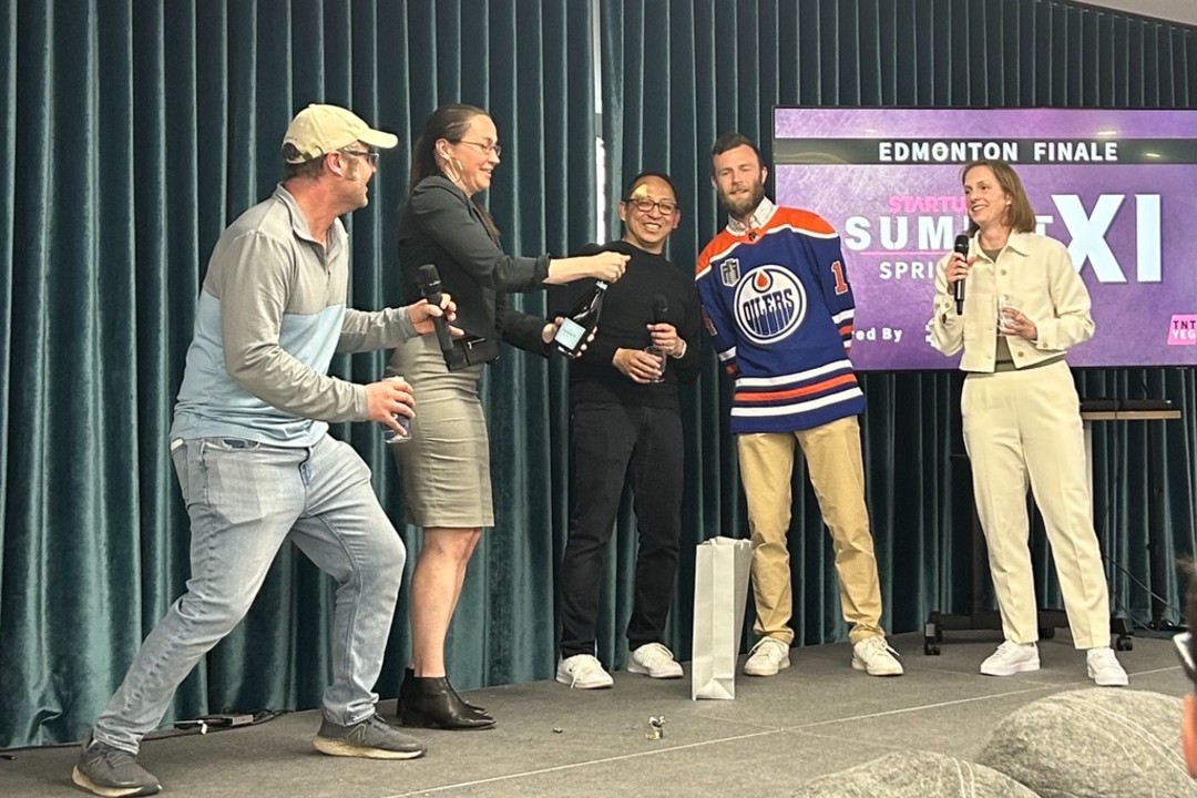 2S Water wins Startup TNT's Summit XI A group of people pop a bottle of sparkling wine on stage
