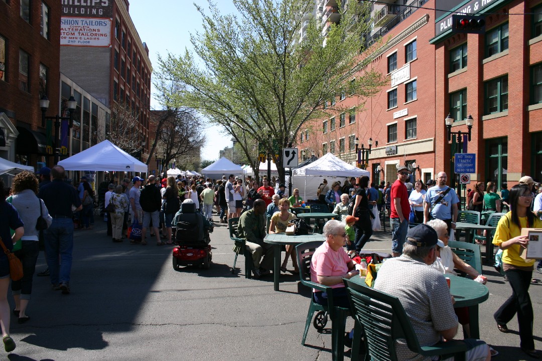 City proposes adding second downtown entertainment district on 104 Street Dozens of people mill about at the Downtown Farmers' Market.