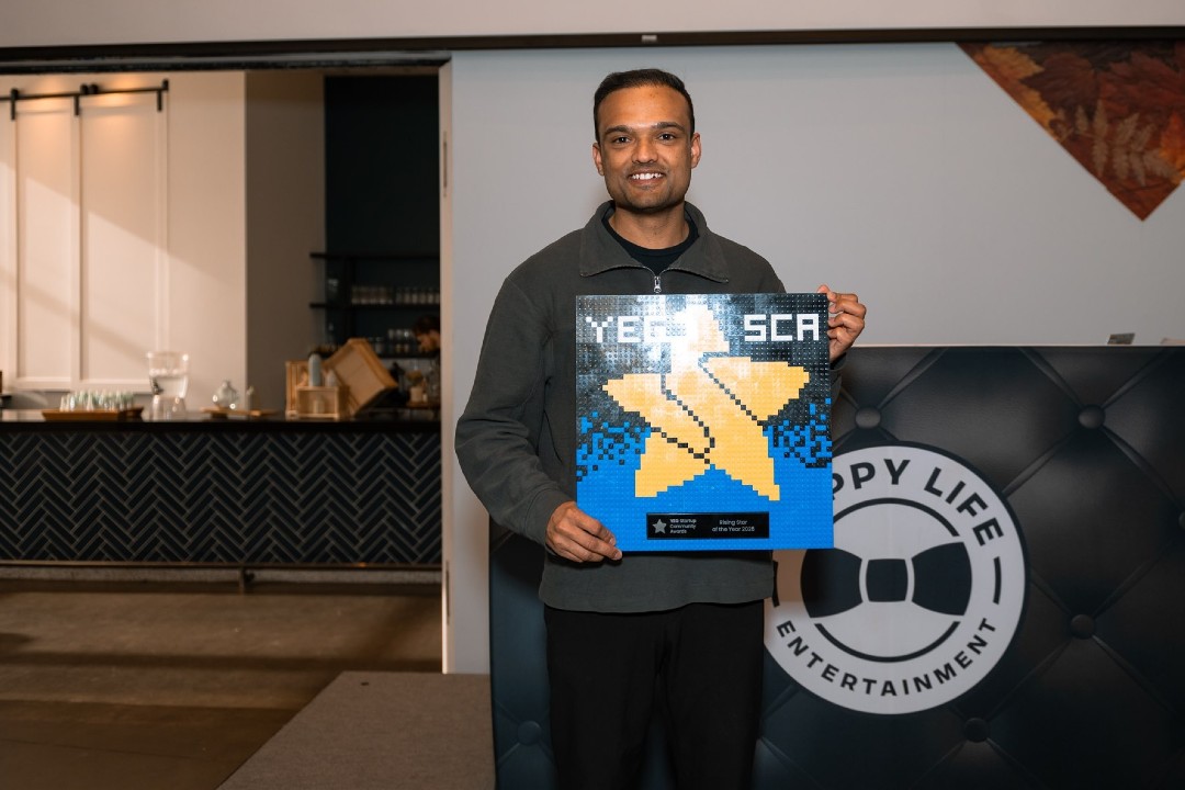 The Drive AI aims to make file management smarter A smiling person holds a rectangular award plaque.