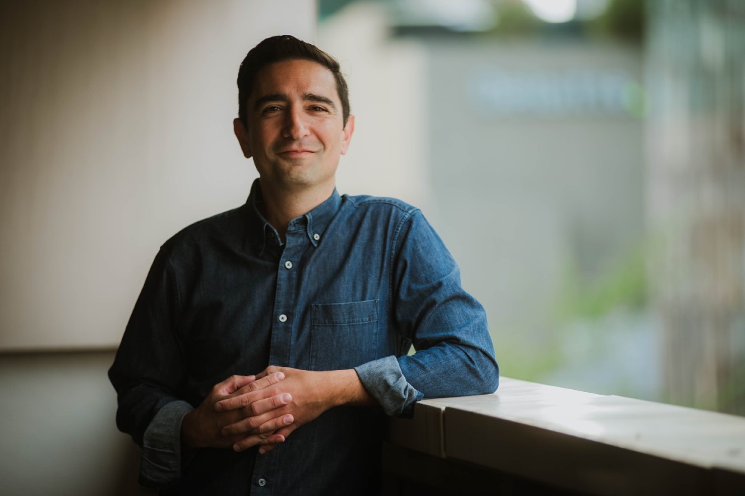 The city is poetry for Marco Melfi [A man poses for a headshot