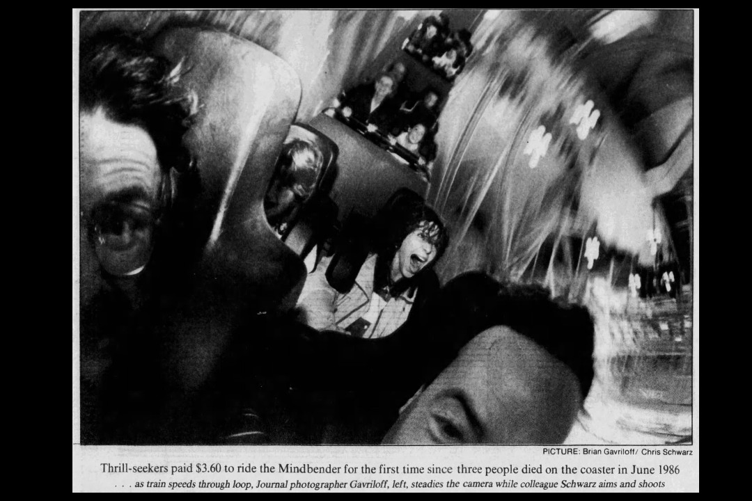 [A photograph of people on a roller-coaster. The caption explains it is the first ride of the Mindbender since an accident that killed three people.
