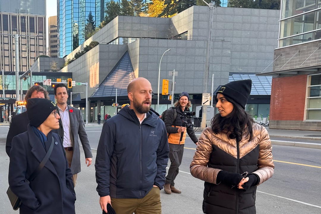 A photo of people walking on a downtown Edmonton street near the Edmonton City Centre mall.