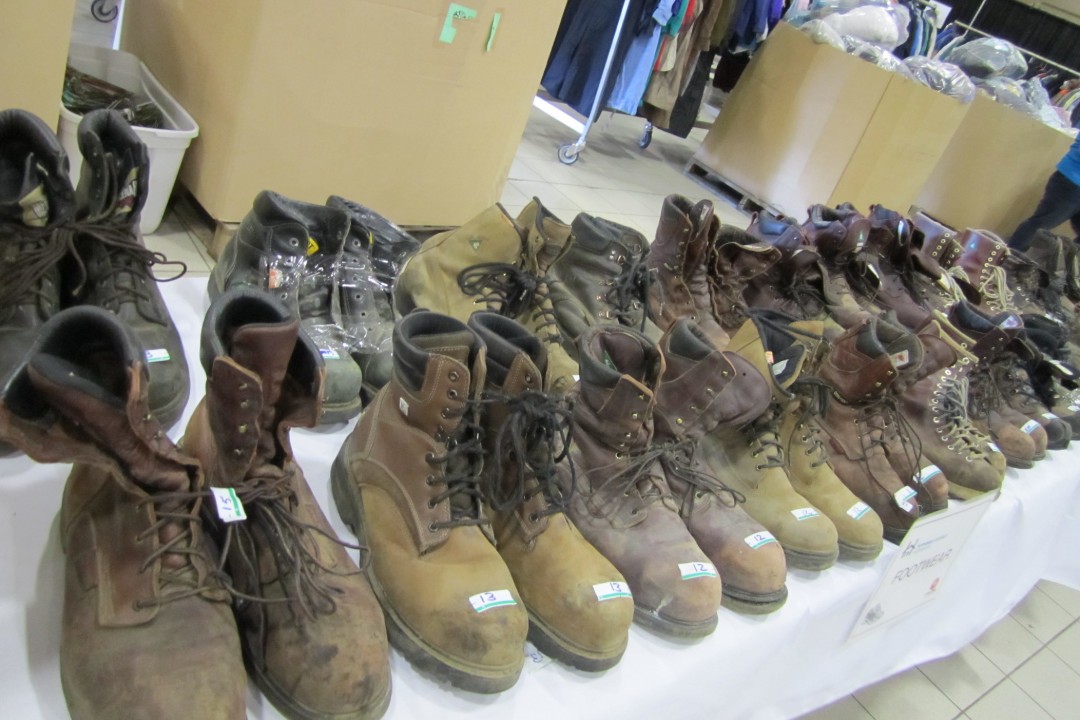 A photograph of boots on a table.