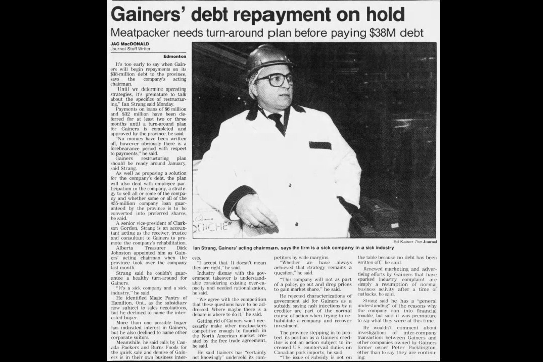 A newspaper clipping with a headline that reads, "Gainers' debt repayment on hold"