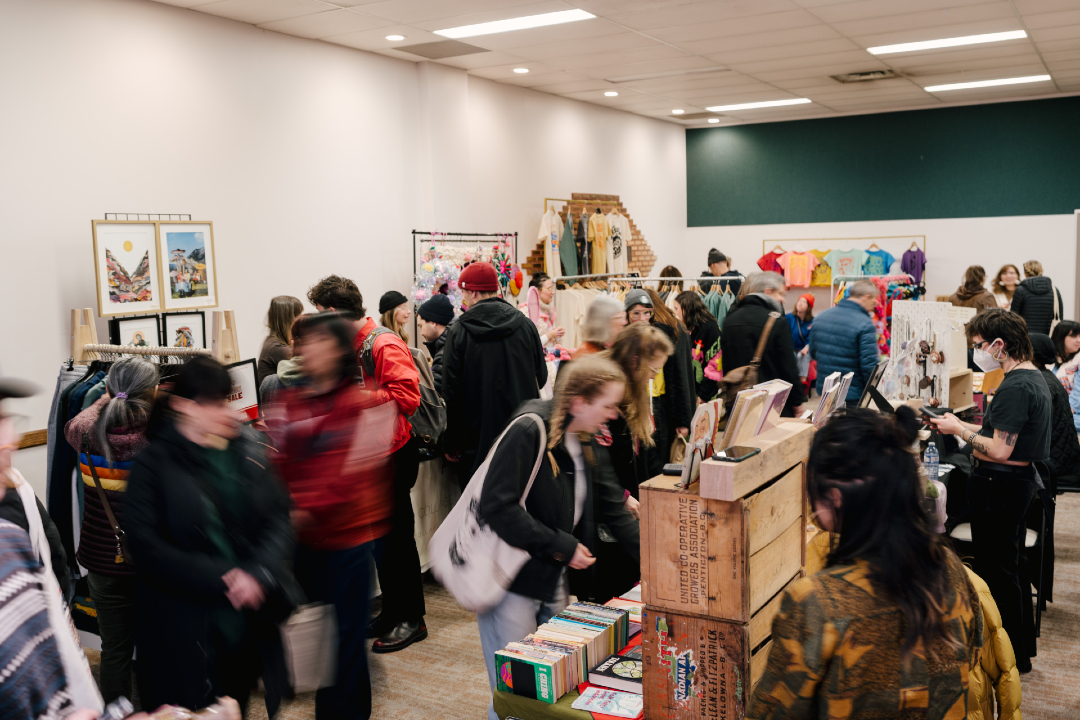 Shoppers gathered inside an arts and crafts market.