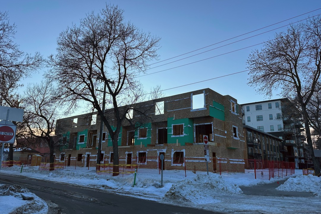 A six-unit rowhouse under construction.