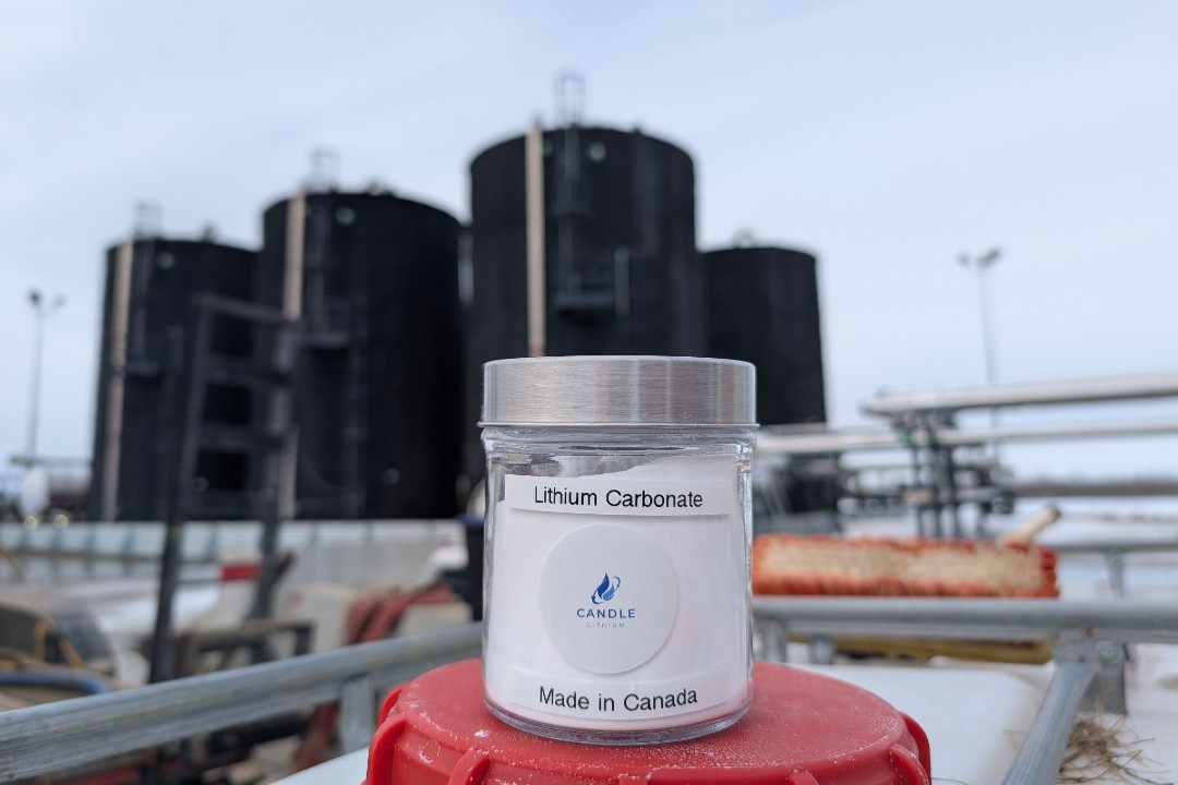 A jar of extracted lithium carbonate labelled CANDLE Lithium and Made in Canada