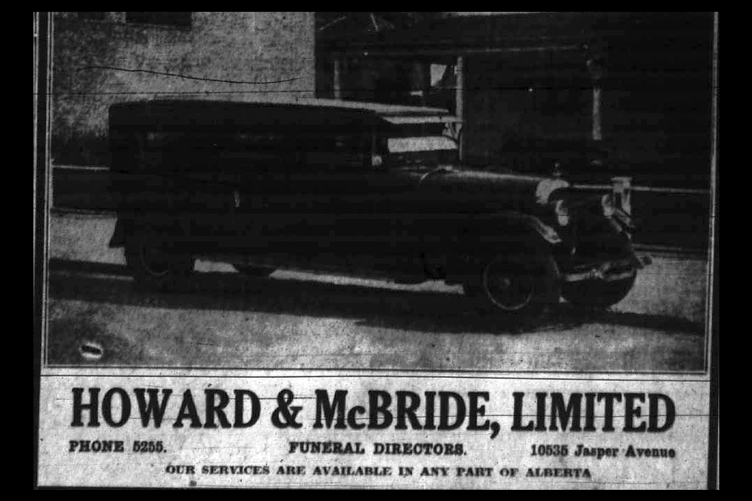 A newspaper clipping of an ad for Howard and McBride with a picture of a hearse
