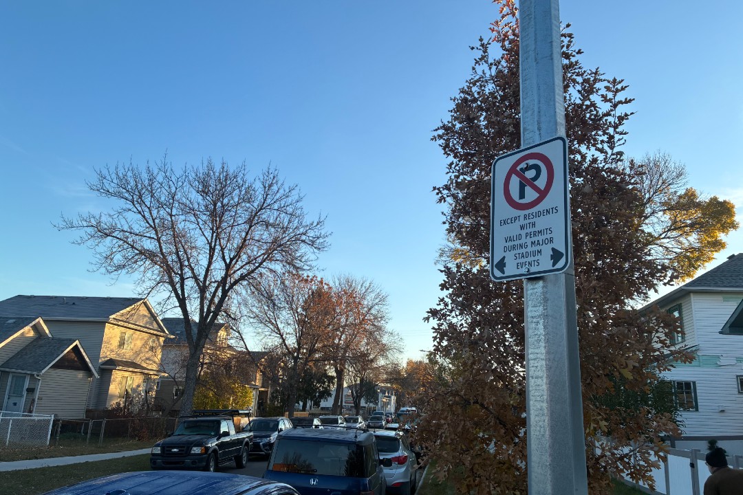 A sign restricting parking to residents with permits