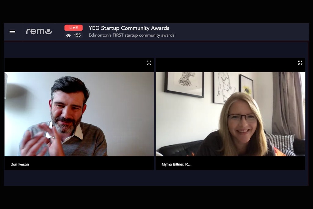 Mayor Don Iveson claps for a smiling Myrna Bittner in a screen grab from the YEG Community Startup Awards